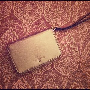 Gently used Rose Gold Kate Spade wristlet
